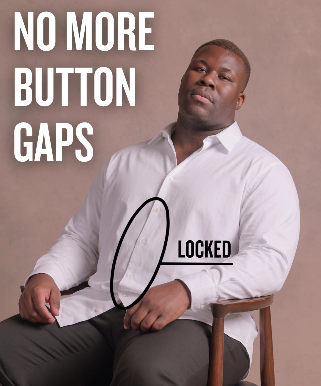 Black man sitting on a chair wearing a white long-sleeve dress shirt, pointing at the button placket to show no button gap, front view
