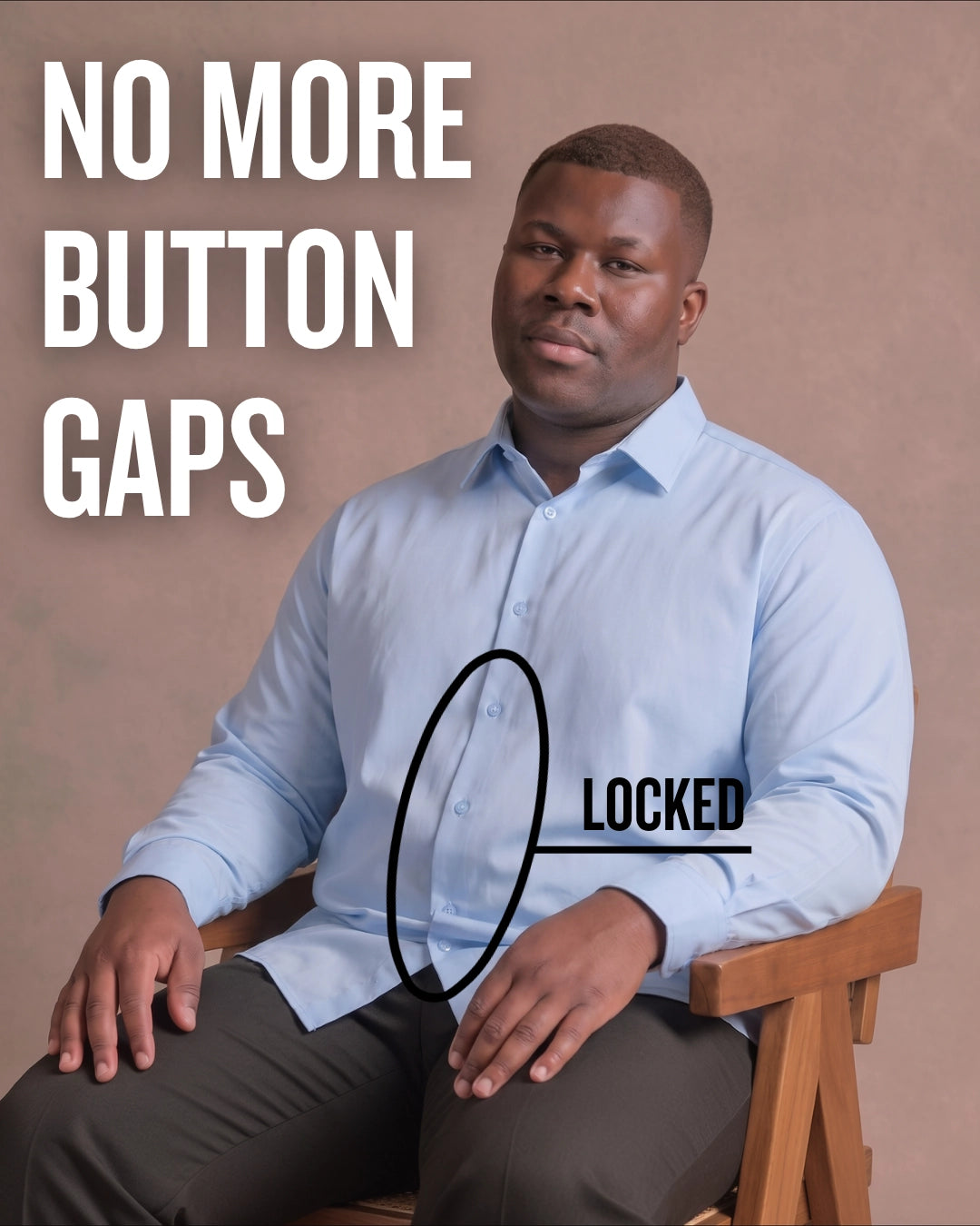 Black man sitting on a chair wearing a light blue long-sleeve dress shirt, pointing at the button placket to show no button gap, front view