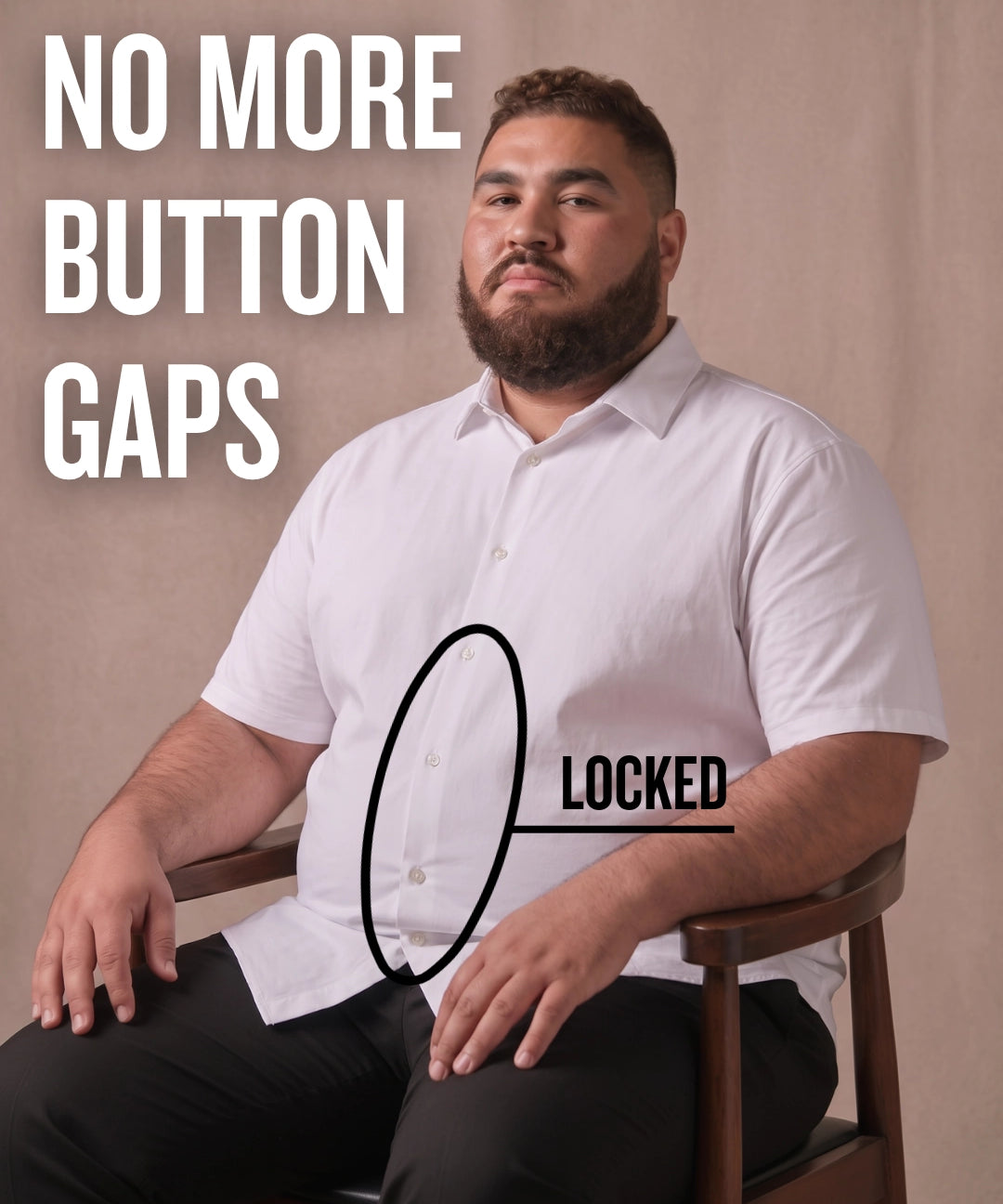 White man sitting on a chair wearing a white short-sleeve dress shirt, pointing at the button placket to show no button gap, front view
