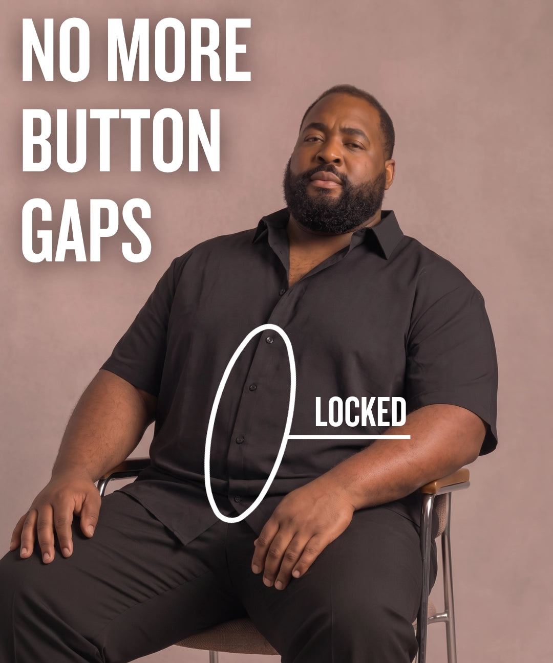 Black man sitting on a chair wearing a black short-sleeve dress shirt, pointing at the button placket to show no button gap, front view
