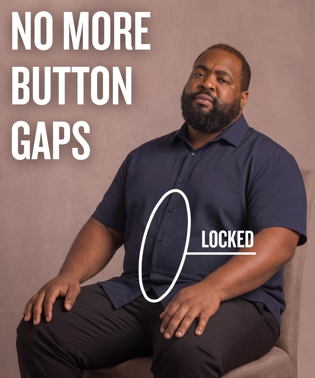 Black man sitting on a chair wearing a navy short-sleeve dress shirt, pointing at the button placket to show no button gap, front view