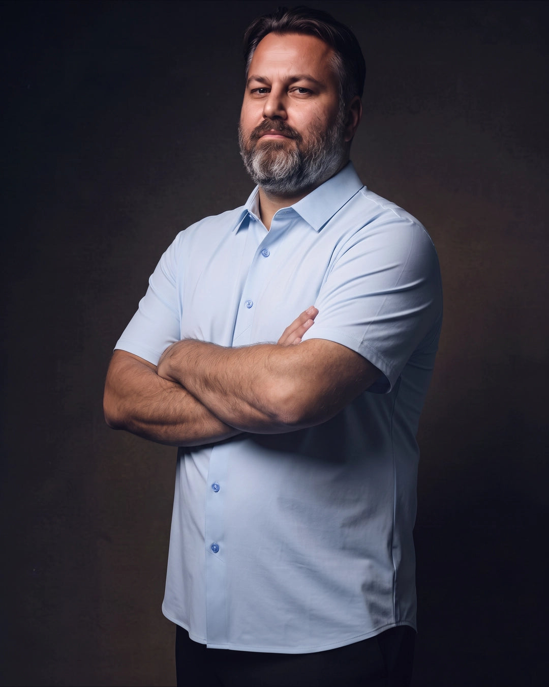Plus-size white man trying on NEVER GAPE No-Gap Stretch Dress Shirt in Light Blue, Short Sleeve, front view