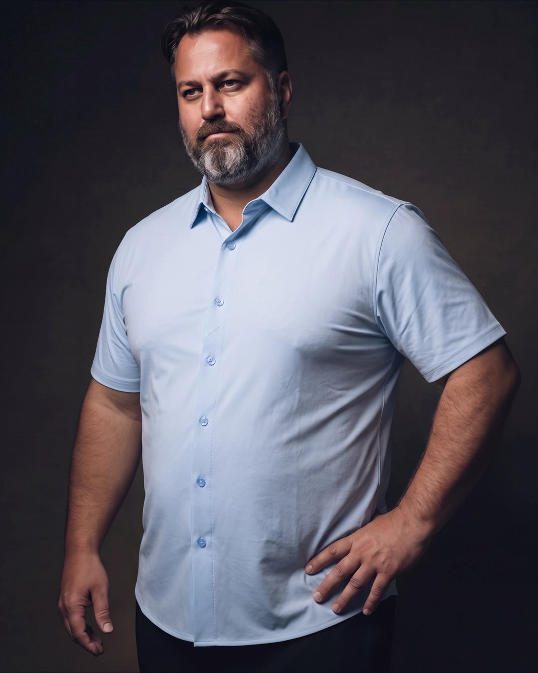 Plus-size white man trying on NEVER GAPE No-Gap Stretch Dress Shirt in Light Blue, Short Sleeve, side view
