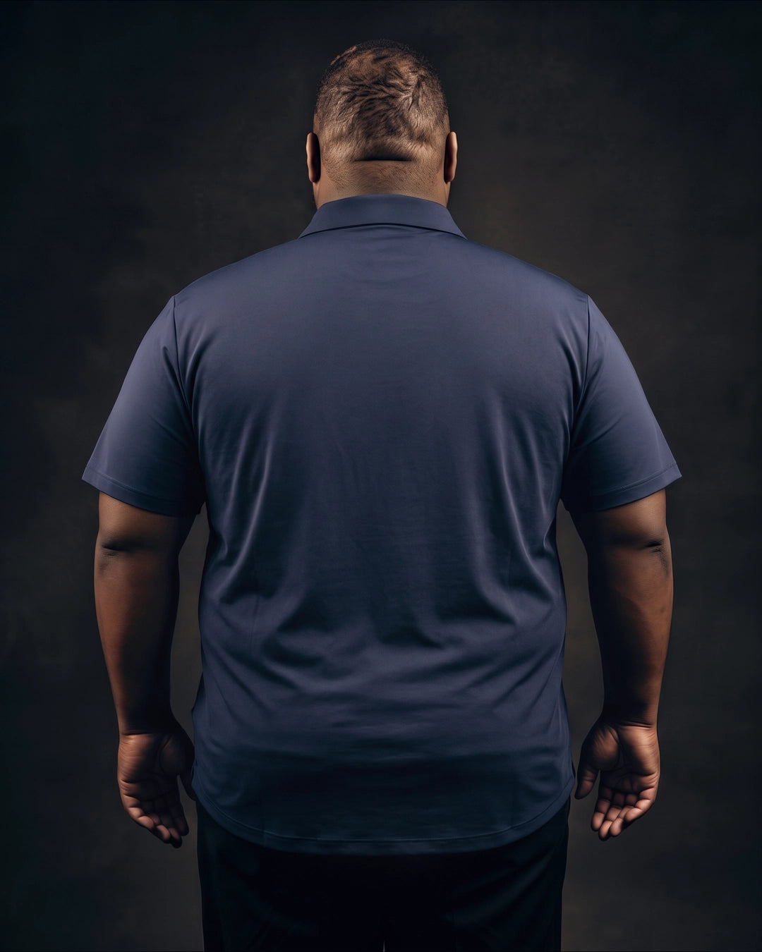 Plus-size Black man trying on NEVER GAPE No-Gap Stretch Dress Shirt in Navy, Short Sleeve, back view