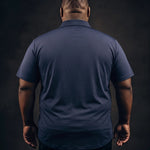 Plus-size Black man trying on NEVER GAPE No-Gap Stretch Dress Shirt in Navy, Short Sleeve, back view