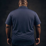 Plus-size Black man trying on NEVER GAPE No-Gap Stretch Dress Shirt in Navy, Short Sleeve, back view