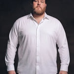 Plus-size white man trying on NEVER GAPE No-Gap Stretch Dress Shirt in White, Long Sleeve, front view