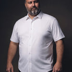 Plus-size white man trying on NEVER GAPE No-Gap Stretch Dress Shirt in White, Short Sleeve, front view