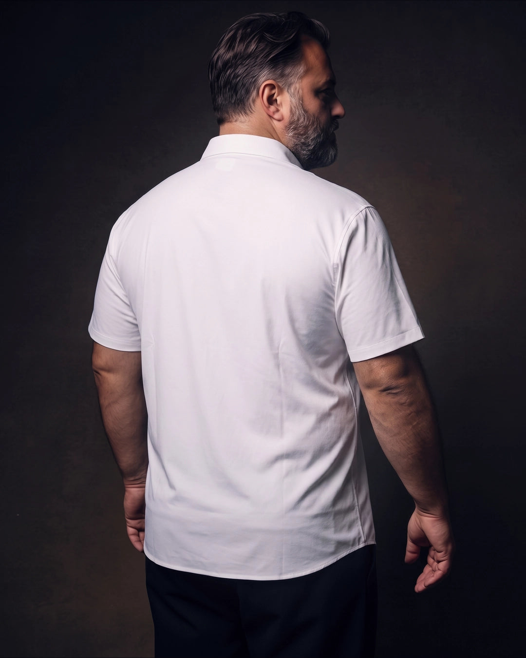 Plus-size white man trying on NEVER GAPE No-Gap Stretch Dress Shirt in White, Short Sleeve, back view
