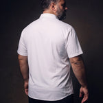Plus-size white man trying on NEVER GAPE No-Gap Stretch Dress Shirt in White, Short Sleeve, back view