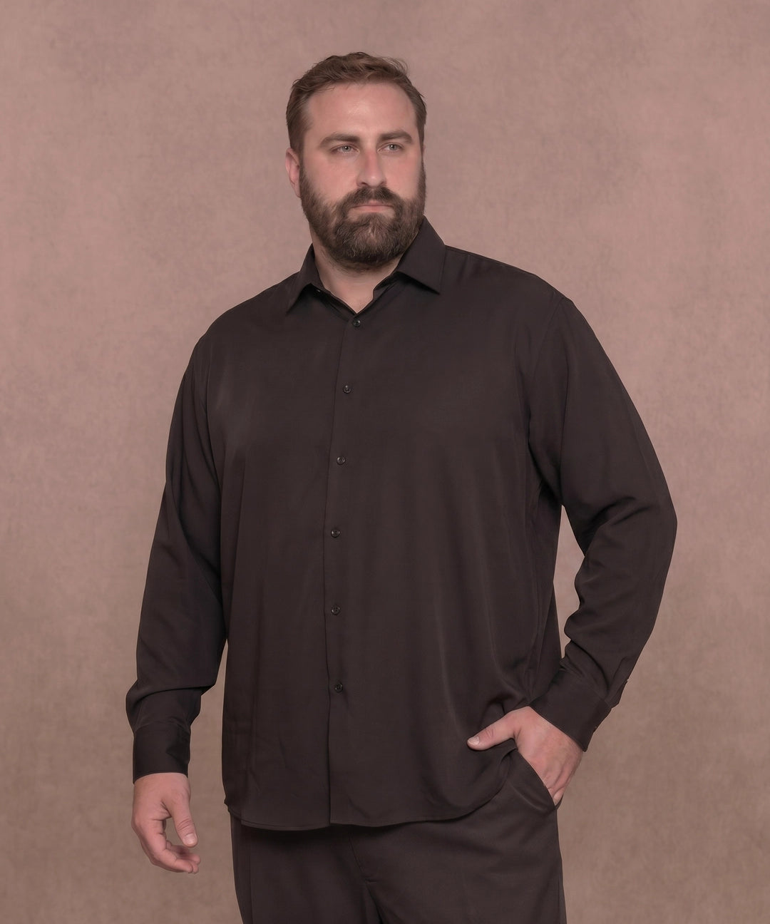 White man wearing a black long-sleeve dress shirt, front view