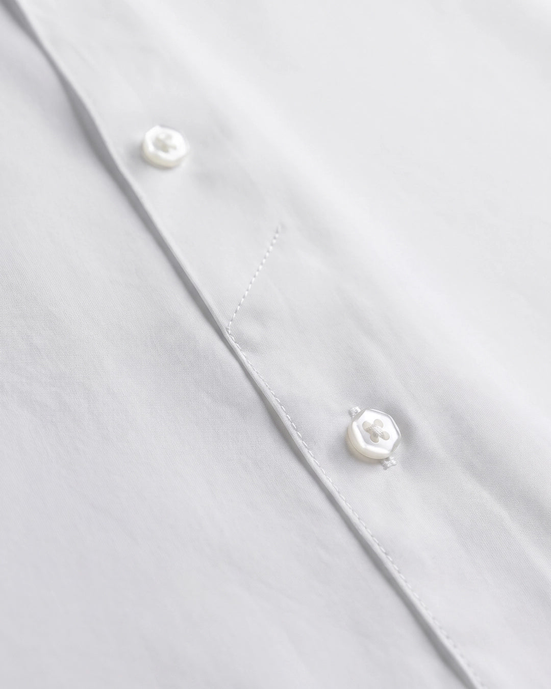 Navy dress shirt fabric detail close-up