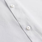 Navy dress shirt fabric detail close-up
